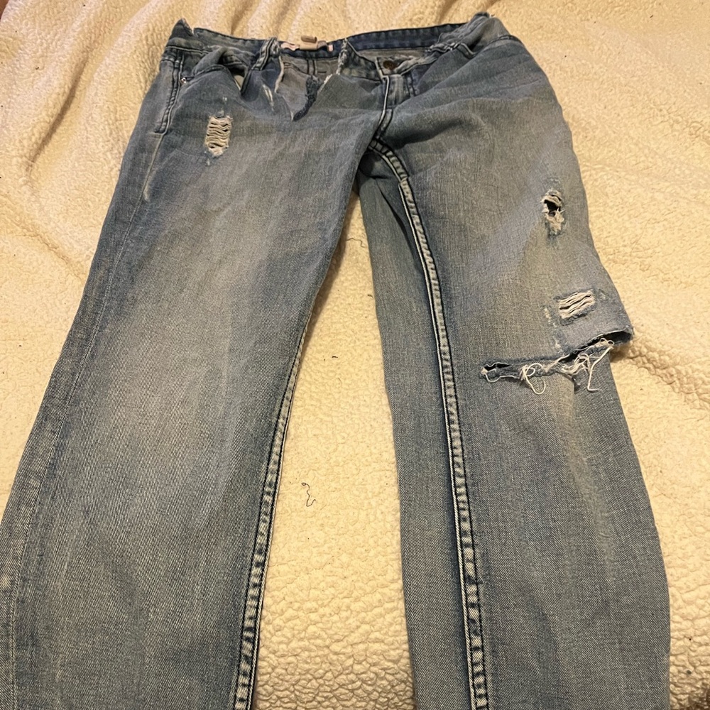 Distressed Blue Women's Jeans 25 waist. Needs major repair